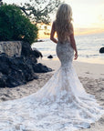Sheer low back beach bridal gown with long train