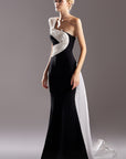 MNM Couture G1502 long one shoulder mermaid style evening gown with perfectly draped fabric details from the shoulder down to the floor.