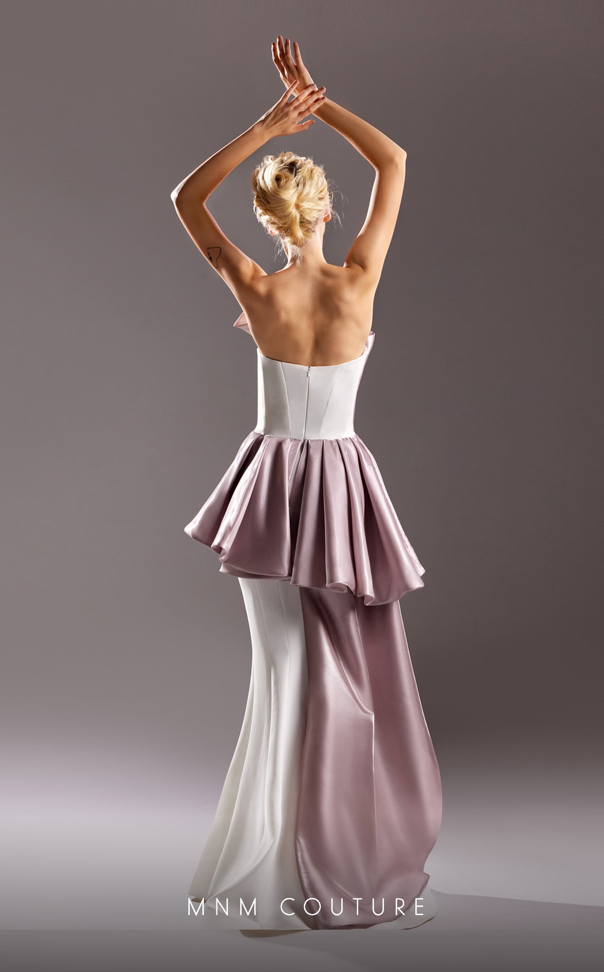 MNM Couture G1517 is show stopper with elegant draping and color blocked fabrics.