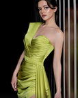 MNM Couture satin one shoulder evening gown with slit and side draping