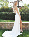 White satin bridal dress with leg slit
